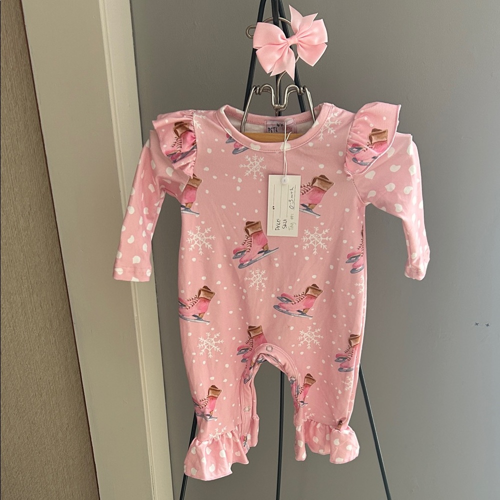 Pete + Lucy Pink Ice Skating Kids One Piece
Size 0-3 months